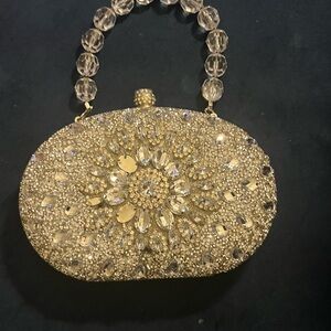Elegant Gold Beaded Clutch